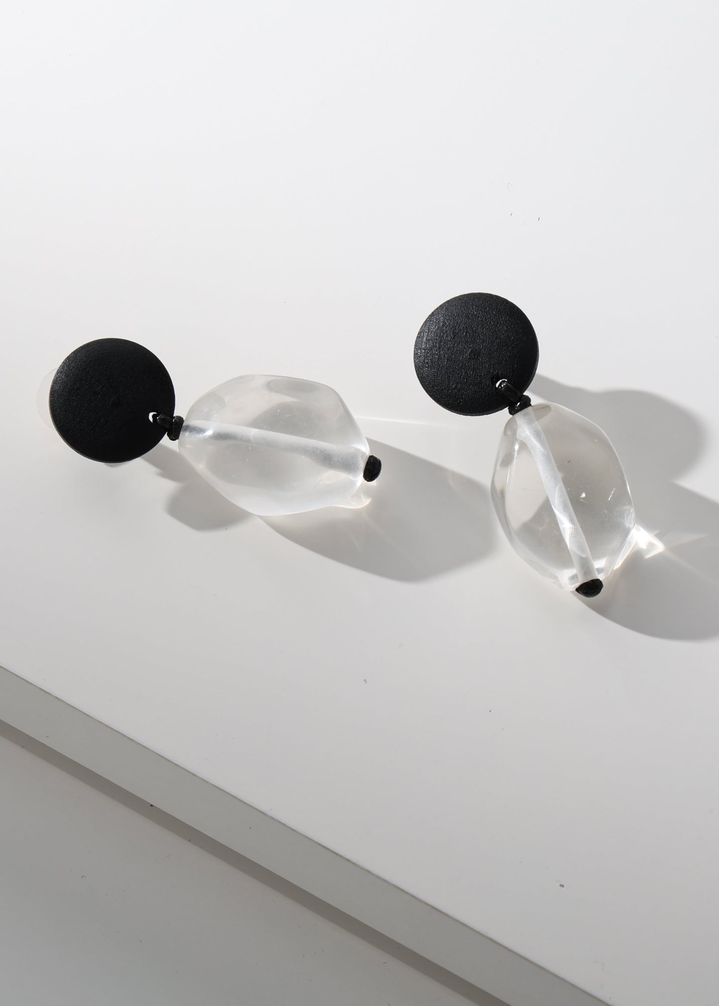 Merx - Black Disc & Clear Resin Drop Earrings