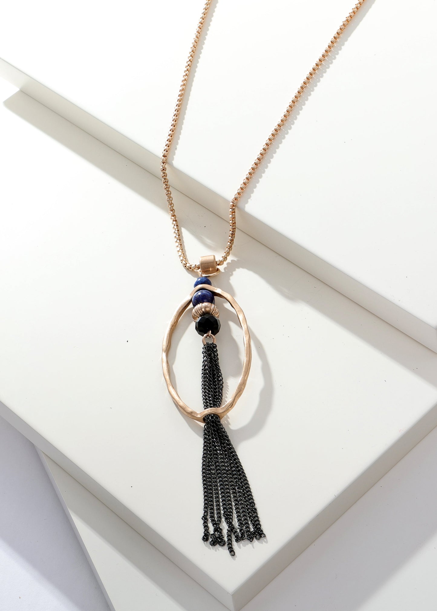Merx - Oval Pendant Necklace with Mixed Stones & Tassel