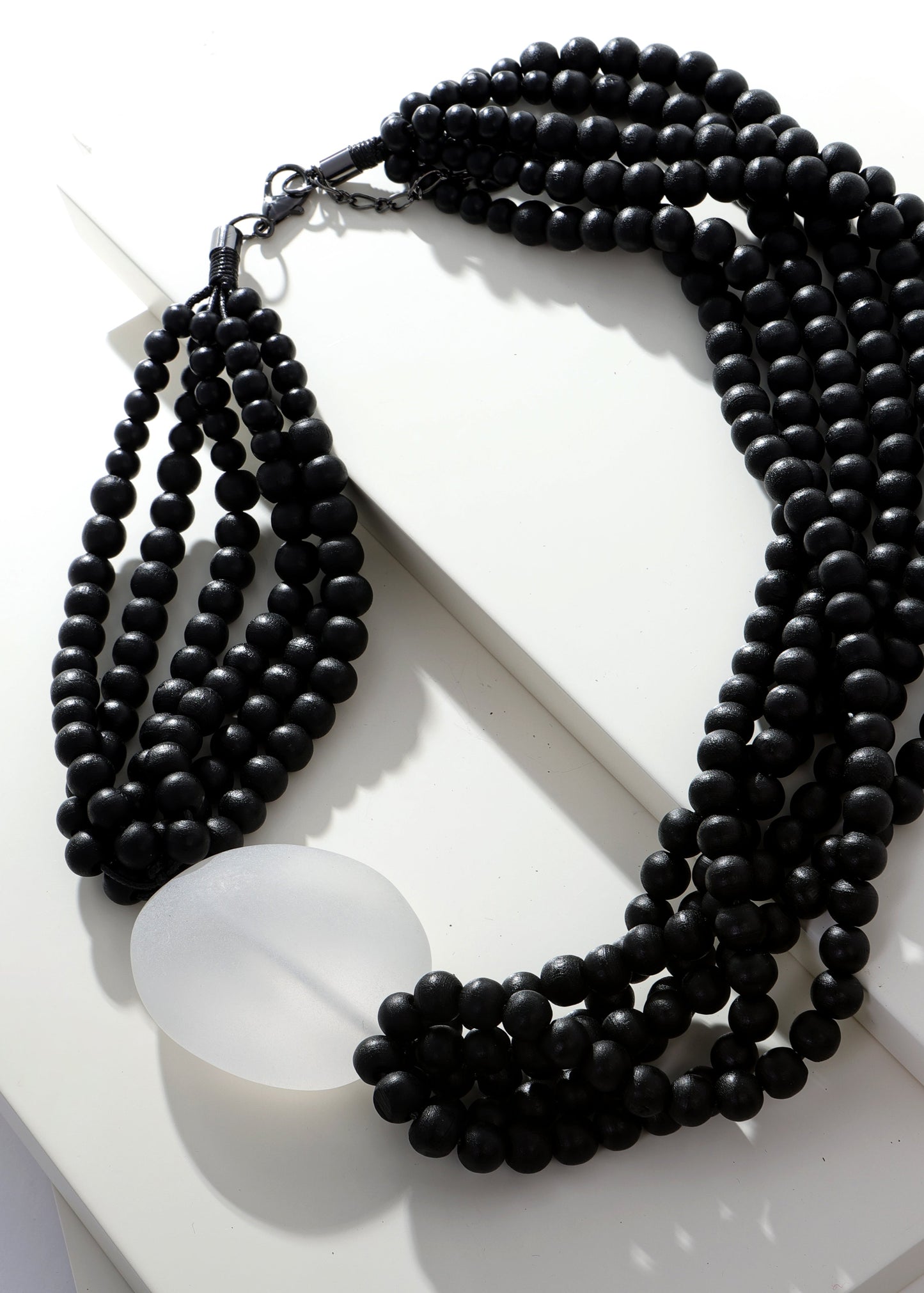 Merx - Bold Black Bead Necklace with Clear Stone Accent