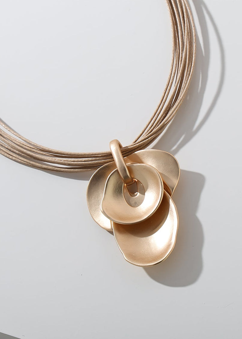 Merx - Multi-Strand Cord & Sculptural Petal Pendant Necklace